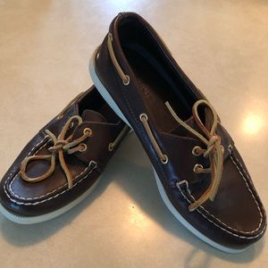 Dark leather Sperry slip on boat shoes